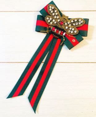 gucci brooch fake|gucci ribbon brooch for sale.